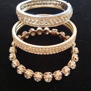 Three glitzy bracelets